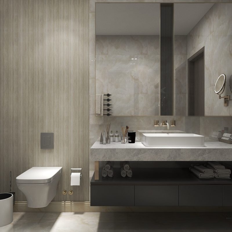 İç mimar tarafından tasarlanan duvara monte tuvalet ve yüzen makyaj masası bulunan modern banyo. Lavabonun üstünde büyük bir ayna, altındaki açık raflarda havlular ve minimalist dekor, her tasarım stüdyosuna veya villaya layık şık bir ambiyans yaratıyor.